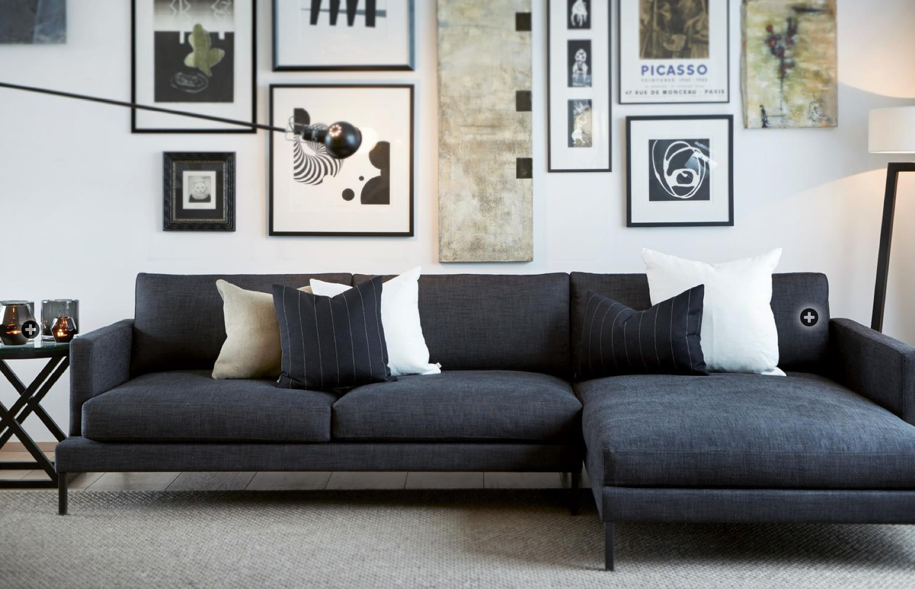 Dark sofa with gallery wall